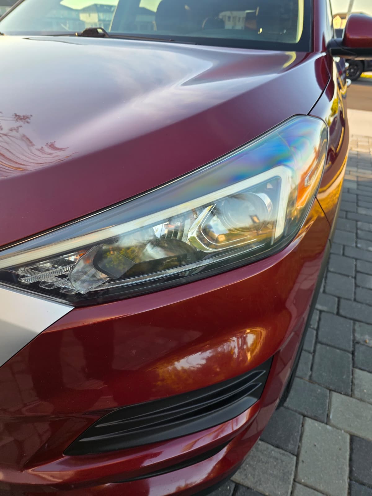 Headlight on a red vehicle — After